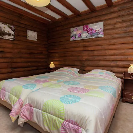 Open Wooden Chalet Built Against A Hill Chalet *