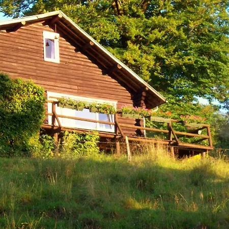 Open Wooden Chalet Built Against A Hill Chalet *