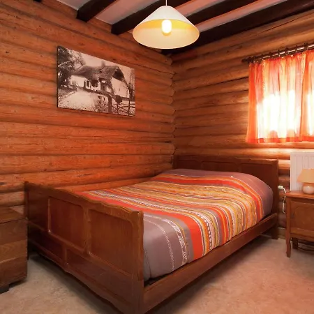 Open Wooden Chalet Built Against A Hill Chalet *